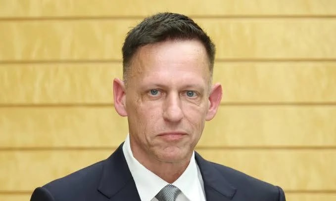 Elementary students working with teacher